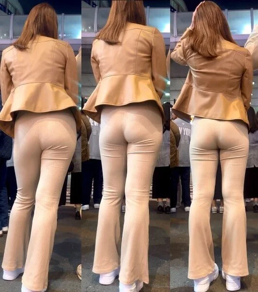 お尻の割れ目くっきりな白ピタパン美女
