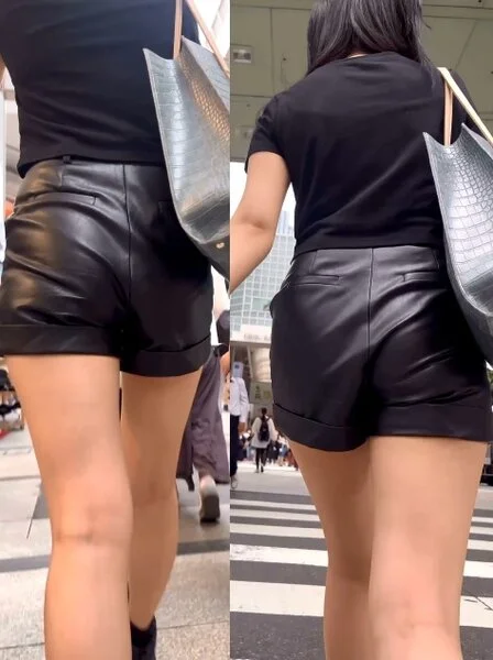 レザーショートパンツ姿で街を歩く美女⑨