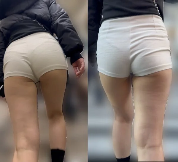 白ショートパンツに生足がセクシーな美女